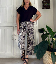 Load image into Gallery viewer, Kokomo Pants LTD in Black and Cream Abstract Botanical